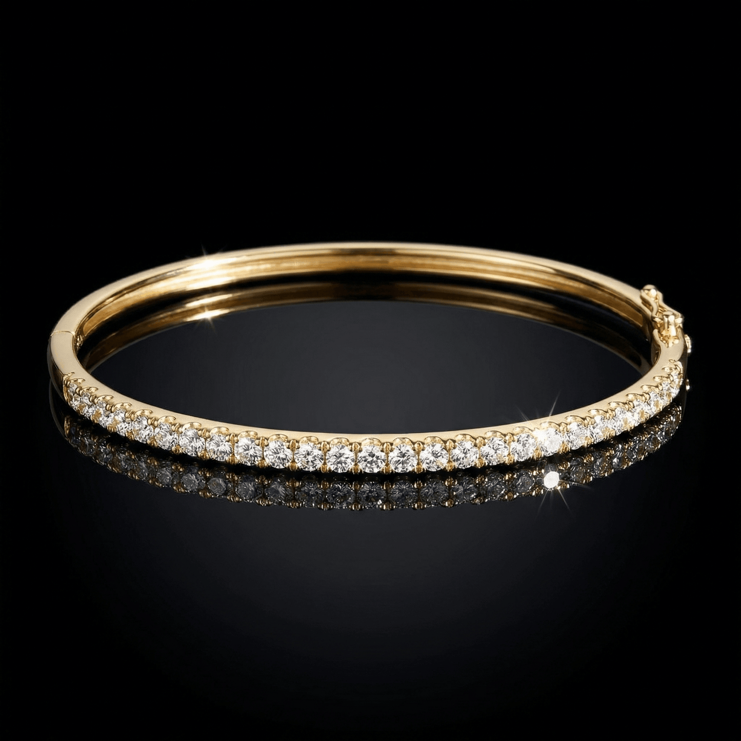 Yellow golden bangle bracelet set with pave diamonds.