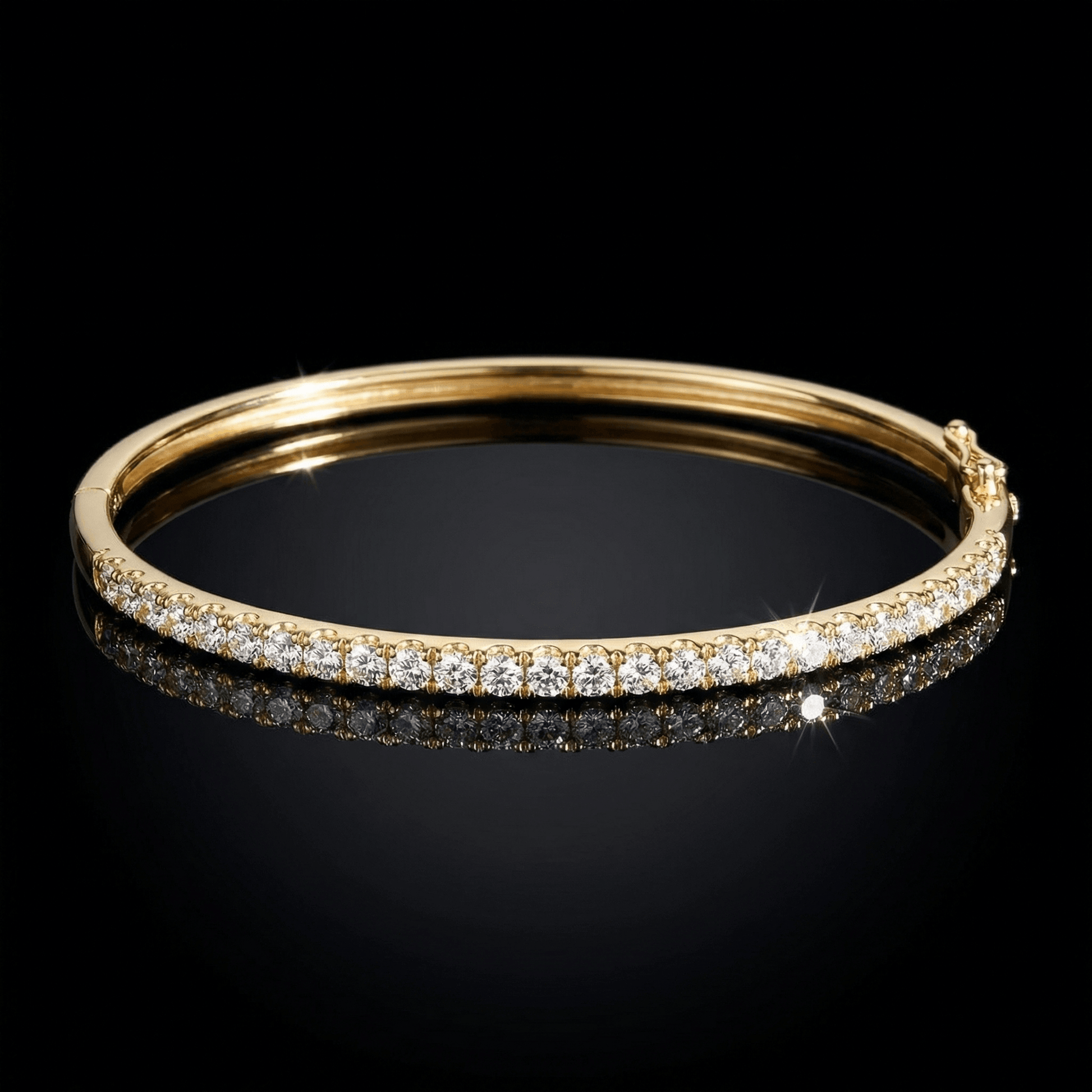 Yellow golden bangle bracelet set with pave diamonds.