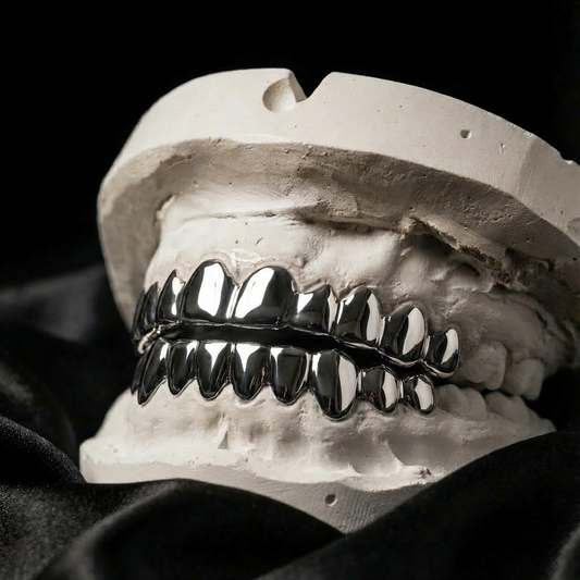 SIlver grillz ten teeth on the top and bottom jaw.