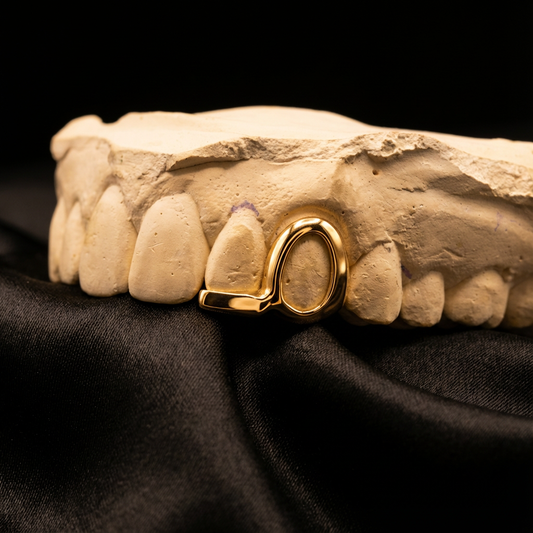Yellow gold custom grillz design with window and bar